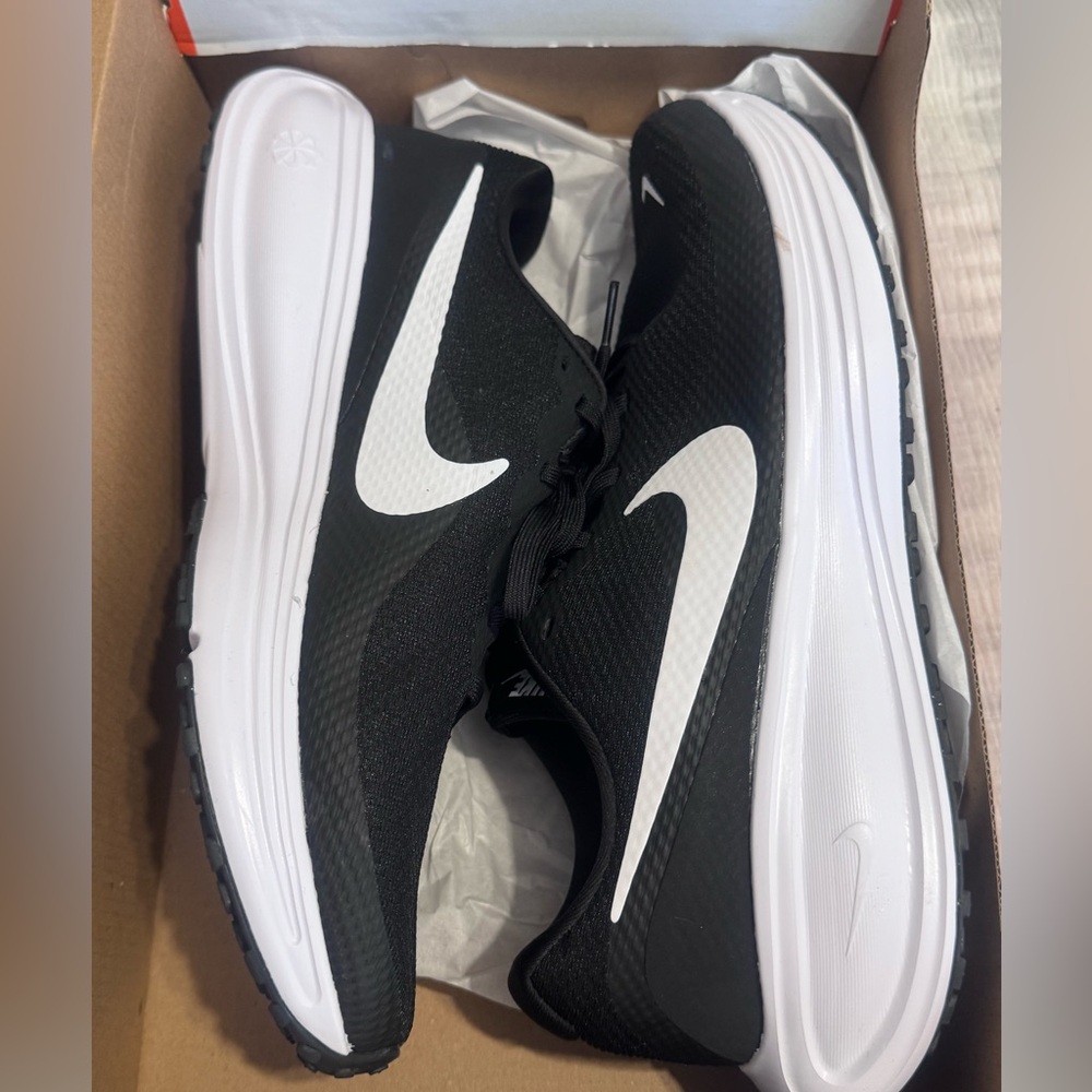 Nike Revolution size 10.5 Wide